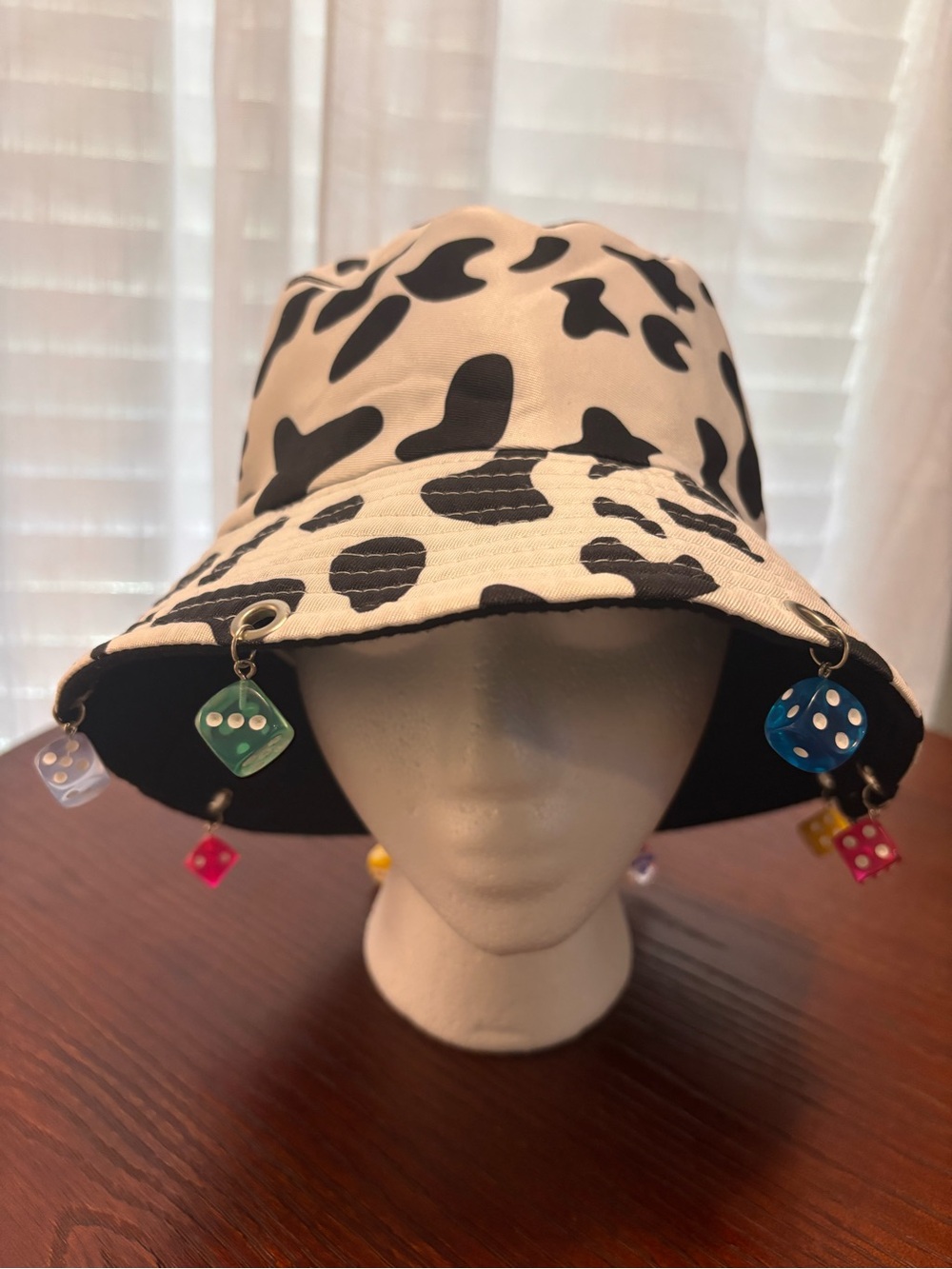 Black & White Cow Print Bucket Hat with Colorful Dice Charms